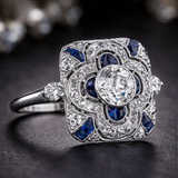 Bague rétro à brillants bleus | Or blanc