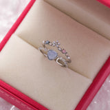 Bague ajustable avec pierre bleue | Or blanc