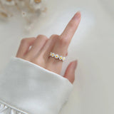Bague en forme de marguerite | Or blanc