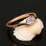Bague rétro avec solitaire et diamants ronds | Or rose