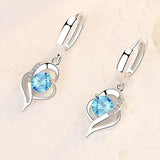 Boucles d'oreilles Éclipse goutte de cœur | Or blanc