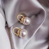 Boucles d'oreilles Fette avec des marguerites | Or