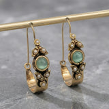 Boucles d'oreilles au style ethno-rétro avec pendentif | Or
