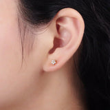 Boucles d'oreilles avec motif floral délicat | Or