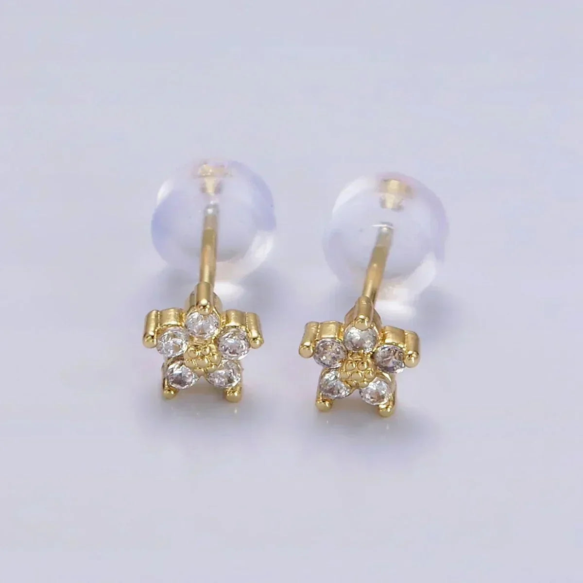 Boucles d'oreilles avec motif floral délicat | Or