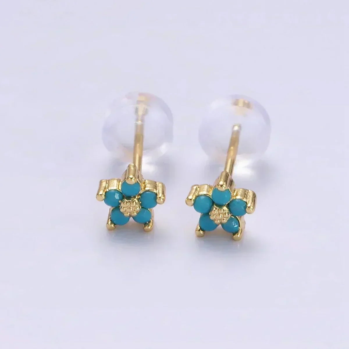 Boucles d'oreilles avec motif floral délicat | Or