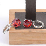 Boucles d'oreilles avec rubis et diamant | Or