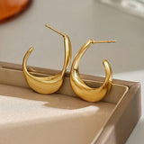 Boucles d'oreilles créoles sculptées en croissant | Or