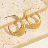 Boucles d'oreilles créoles sculptées en croissant | Or