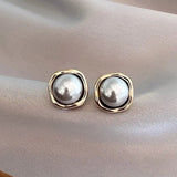 Boucles d'oreilles élégantes en perle noire | Or