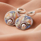 Boucles d'oreilles en acrylique avec perles | Or