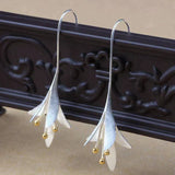 Boucles d'oreilles en fleurs | Or blanc