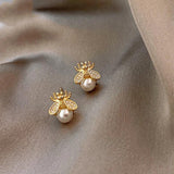 Boucles d'oreilles en perle et brillants | Or