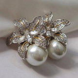 Boucles d'oreilles pendantes avec fleur et marguerite | Or