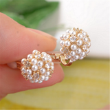 Boucles d'oreilles rétro avec ornement en perles | Or