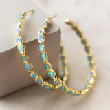 Boucles d'oreilles rétro avec opale bleue | Or