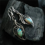 Boucles d'oreilles rétro avec opale bleue | Or blanc