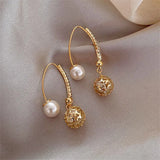 Boucles d'oreilles rétro avec des marguerites | Or