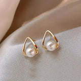 Boucles d'oreilles triangulaires avec des perles élégantes | Or