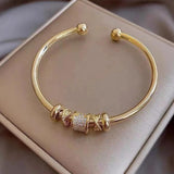 Bracelet ajustable avec pendentifs | Or