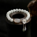 Bracelet avec Aigue-marine et marguerites | Or