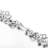 Bracelet avec pattes de chien suspendues et Os Brut, Édition limitée | Or blanc