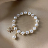 Bracelet avec médaillon, marguerite et tournesol | Or blanc
