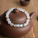 Bracelet de confiance avec des marguerites et de la pierre de lune | Or