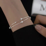 Bracelet avec étoiles | Or blanc