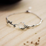 Bracelet rétro avec branche de fleur | Or blanc