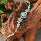 Bracelet avec des papillons | Or blanc