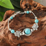 Bracelet avec des papillons | Or blanc