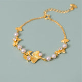Bracelet classique avec des feuilles de ginkgo et des marguerites | Or