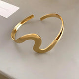 Bracelet ouvert classique avec motif ondulé | Or