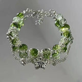 Bracelet rétro avec papillon et perles vertes | Or blanc