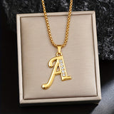 Collier initial en cristal accent | Or