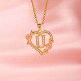 Collier initiale charme floral | Or