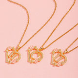 Collier initiale charme floral | Or