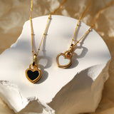 Collier avec pendentif en noir et blanc cœur | Or