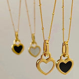 Collier avec pendentif en noir et blanc cœur | Or