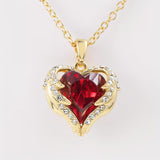 Collier de cœur en rubis étreinte d'ange | Or