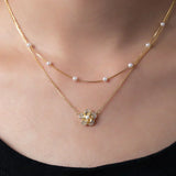 Collier de fleurs avec perles doubles | Or