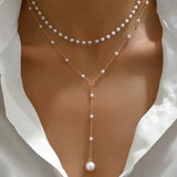 Collier de perles à deux rangs avec pendentifs | Or