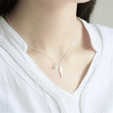 Collier avec des marguerites et un chat grimpeur | Or blanc