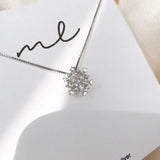 Collier en cristal avec neige brillante | Or rose