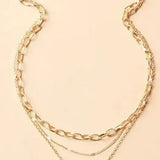 Collier rétro avec des couches de chaîne et pendentif | Or
