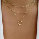 Collier rétro avec des couches de chaîne et pendentif | Or
