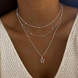 Collier rétro avec étoile | Or