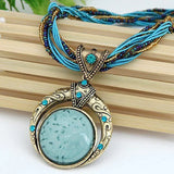 Collier rétro avec pendentif ethnologique en cristal vert | Or