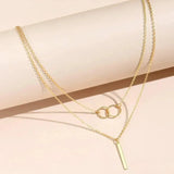 Collier rétro avec pendentif rond double | Or